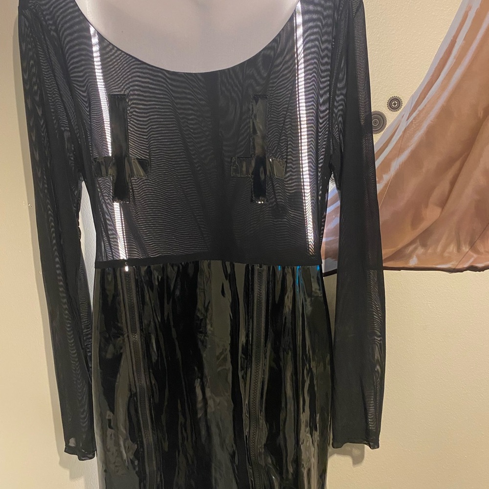 Dolls Kill: TRICKZ N’ TREATZ very sexy nun costume.